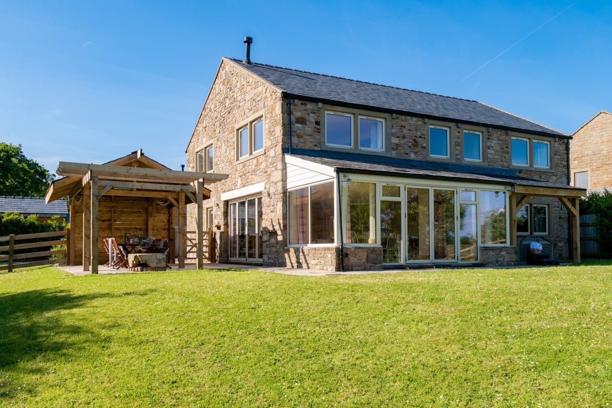 Large lawned garden to rear of the cottage